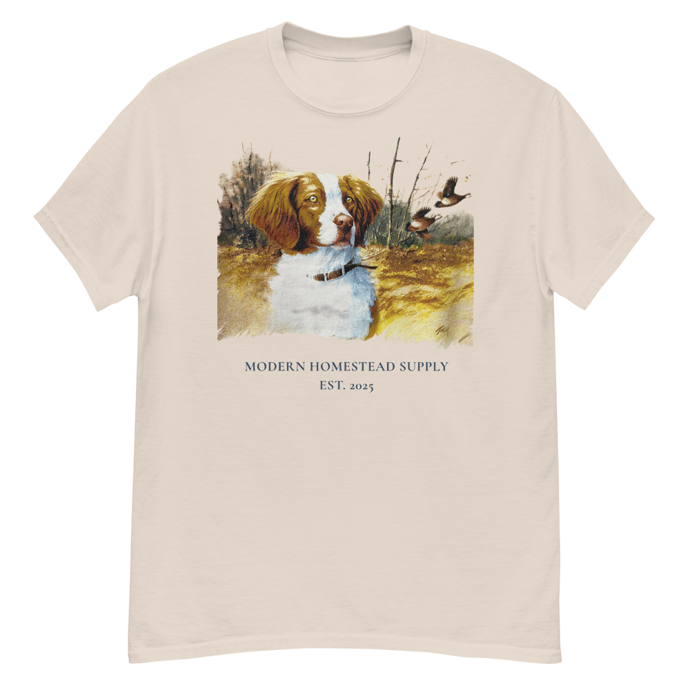 Beige t-shirt with a dog and duck design and 'Modern Homestead Supply' text.