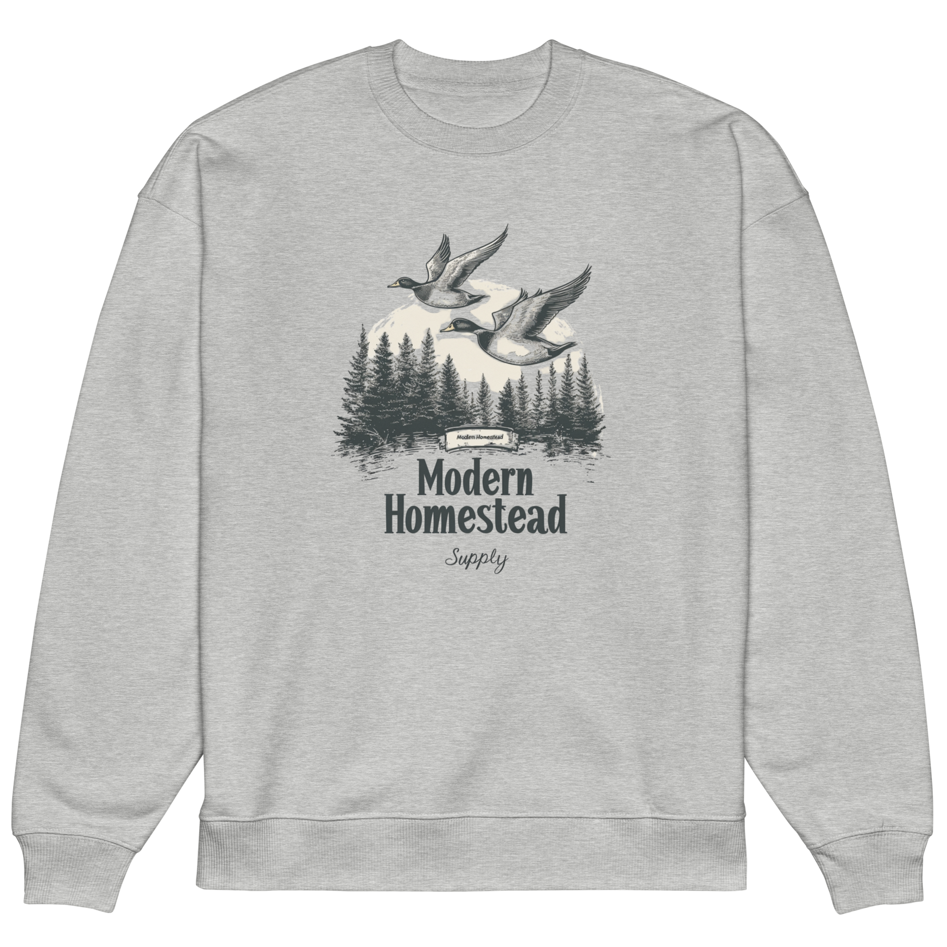 Gray sweatshirt with 'Modern Homestead Supply' graphic featuring ducks and trees on a white background